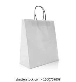 White kraft paper gift bag with handle for easy carry. Cut out on white background. Eco friendly & reusable shopping bag for groceries, gifts, goodies. Design template for Mock up, Branding, Advertise - Shutterstock ID 1580759809