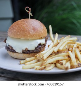 White Label Burger 
Special Blend Of Chick, Brisket,short Rib And Aged Ribeye, Bacon Marmalade, Pickles, Mustard, Mayonnaise, American Cheese, Served With French Fries And Ramp Aioli 