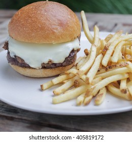 White Label Burger 
Special Blend Of Chick, Brisket,short Rib And Aged Ribeye, Bacon Marmalade, Pickles, Mustard, Mayonnaise, American Cheese, Served With French Fries And Ramp Aioli 