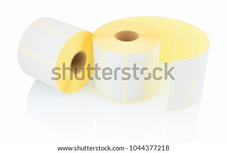 White label rolls isolated on white background with shadow reflection. Color reels of labels for printers. Labels for direct thermal or thermal transfer printing. White stickers on white backdrop.