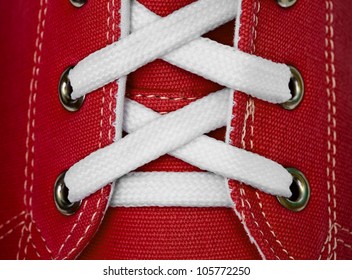 White Lace On Red Sneakers Close Up