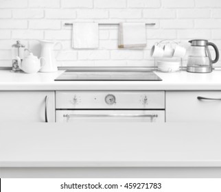 White Laminated Table On Defocused Rustic Kitchen Bench Interior Background