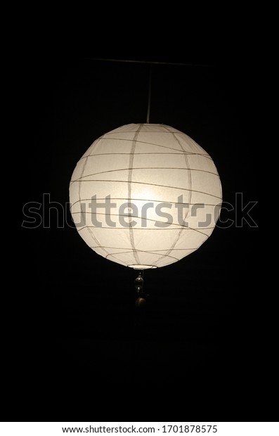 
white lamp in the
darkness of black