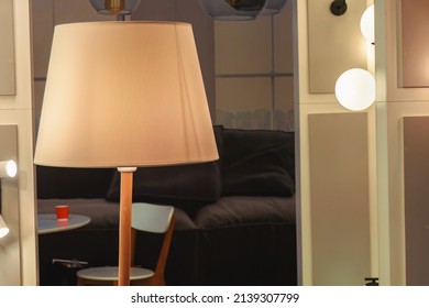 White Lampshade Of A Table Lamp In The Room.