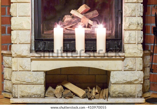 White Large Candles Standing On Fireplace Stock Photo Edit Now