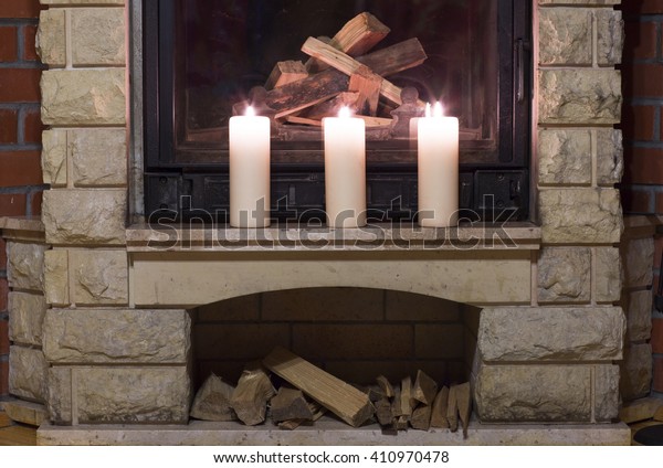 White Large Candles Standing On Fireplace Stock Photo Edit Now