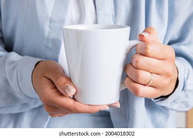 White Latte Mug In The Hands Of The Girl For Presentation Custom Sublimation Print. Blank Mug Photo Mockup Template
