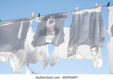 White laundry drying on a washing line