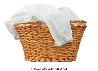 White Laundry In A Wicker Basket, Isolated On White