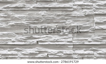 White layered stone wall texture close up