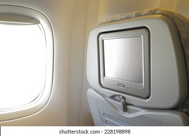 White LCD Screen In An Airplane Seat, Copy Space For Text Or Image