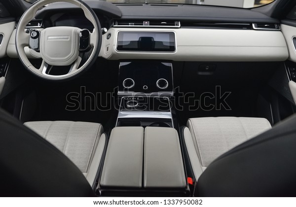 White,\
leather, luxury, modern interior of the new\
car.