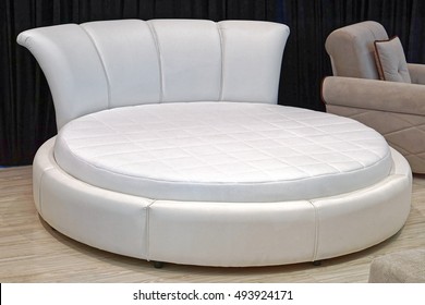 White Leather Round Bed In Bedroom