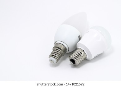 White LED Round Bulb With Connector Type E17 And White LED Candelabra Bulb With Connector Type E14 For Energy Saving Isolated On White Background.