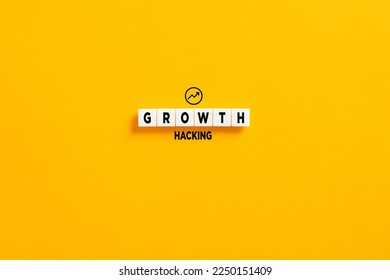White letter blocks on yellow background with the word growth hacking. Growth hacking in marketing and business concept.