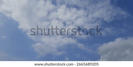 WHITE LIGHT CLOUDS IN BRIGHT DAY