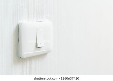 White Light Switch On Wall