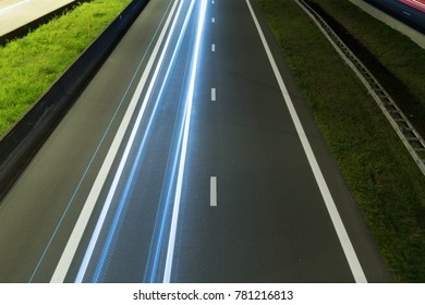 white light trail on an empty highway in Belgium (e19)
