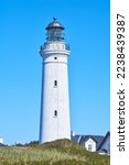 White Lighthouse Hirtshals Fyr at the danish coast. High quality photo