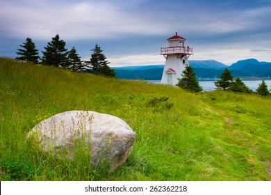 White lighthouse on the coast of Newfoundland, Canada