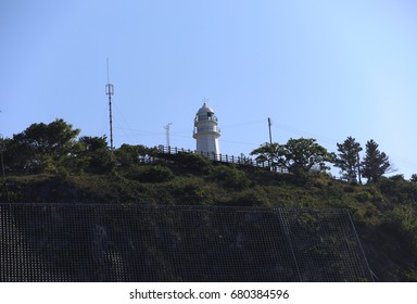 White lighthouse and sky