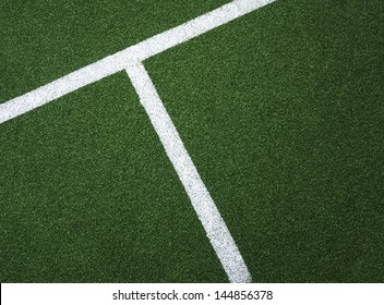 White lined line on grass astroturf