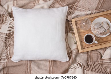 White linen pillow, cushion Mockup on plaid. Inrerior photo