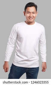 White Long Sleeved T-shirt Mock Up, Front View, Isolated. Male Model Wear Plain White Shirt Mockup. Long Sleeve Shirt Design Template. Blank Tees For Print