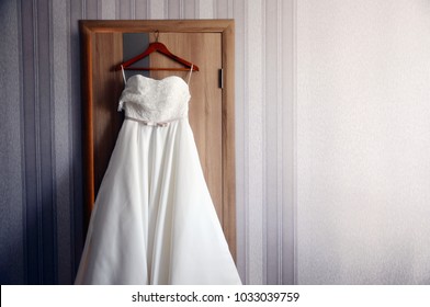 White Long Wedding Dress On The Hanger