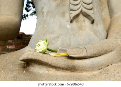 White Lotus, Joss Stick And Candle On Buddha Statue Hand At  Wat Yai Chai Mongkon. Ayutthaya Historical Park, Thailand