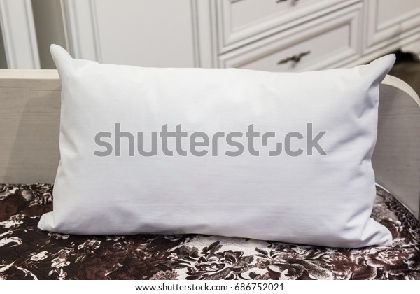 white lumbar pillow