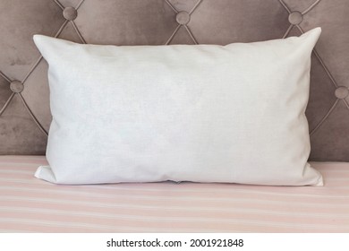 White Lumbar Pillow On A Couch, Case Mockup.