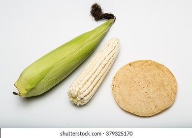 White Maize Corn With Leaves Then Without Leaves And A Mexican Tortilla Illustrating Tortilla Production Process Produced In Mexico Organic Or Transgenic Isolated On White Top View