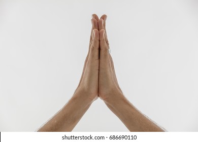 White mans hands in namaste prayer anjali mudra