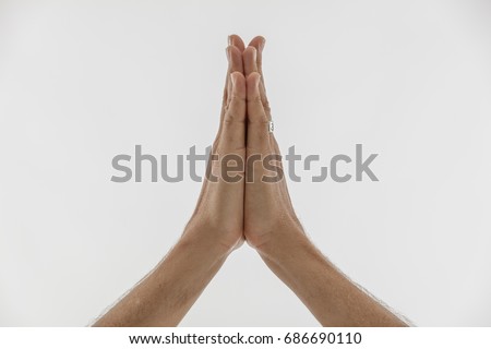 White mans hands in namaste prayer anjali mudra