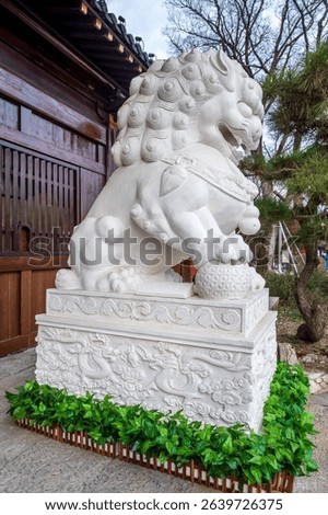 
White marble lion stone carvings in the courtyards of classical Chinese garden architecture