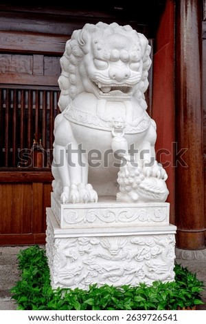 
White marble lion stone carvings in the courtyards of classical Chinese garden architecture