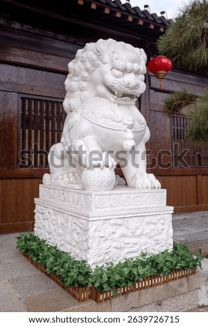 
White marble lion stone carvings in the courtyards of classical Chinese garden architecture