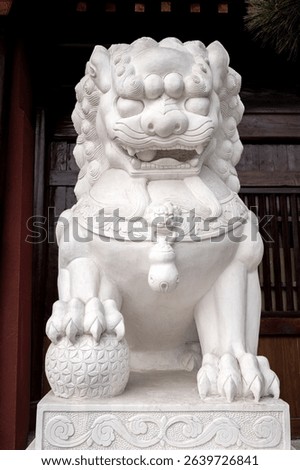 
White marble lion stone carvings in the courtyards of classical Chinese garden architecture