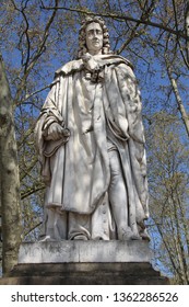 White marble statue of the 17th century philosopher Montesquieu located at the Place des Quinconces in Bordeaux, France.