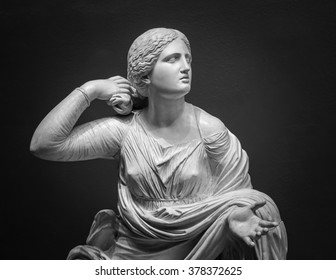 White Marble Statue Of Young Woman