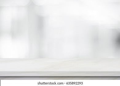 White marble table background, Shelf for kitchen mockup, White marble tabletop over blur perspective restaurant 
 with bokeh light background, Empty desk, table top for store product display template 