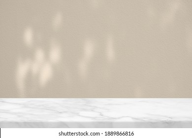 White Marble Table With Bokeh Light On Concrete Wall Texture Background In Set Sail Champagne Color Tone, Suitable For Product Presentation Backdrop, Display, And Mock Up.