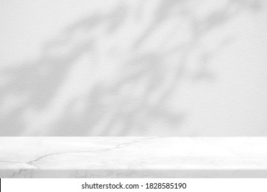 White Marble Table With Tree Shadow On Concrete Wall Texture Background, Suitable For Product Presentation Backdrop, Display, And Mock Up.