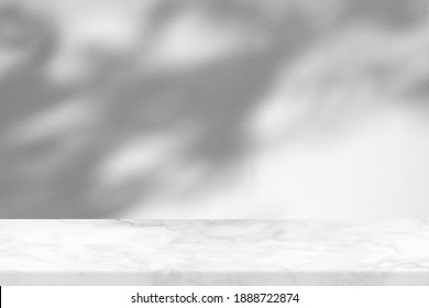 White Marble Table With Tree Shadow On Concrete Wall Texture Background, Suitable For Product Presentation Backdrop, Display, And Mock Up.