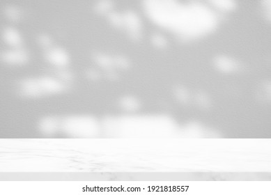 White Marble Table with Tree Shadow in the Garden on Concrete Wall Texture Background, Suitable for Product Presentation Backdrop, Display, and Mock up. - Shutterstock ID 1921818557