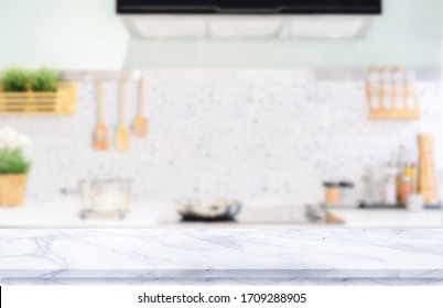 White marble texture  table top on blurred kitchen background - Shutterstock ID 1709288905