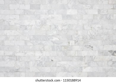 White marble wall pattern with high resolution. Brick wall made from marble use as texture and background.