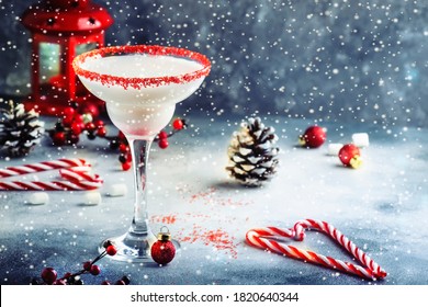 White Margarita, Christmas Or New Year's Winter Alcoholic Cocktail With Rum, Coconut And Irish Cream With Red Decor In Stylish Table Setting