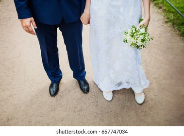 White Marrige Couple With Flowers And Rings 